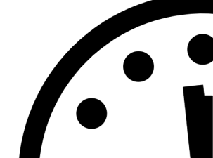 Black and which image showing the top left quarter of a clock. In this Doomsday clock, the hands are positioned at 1 minute to midnight