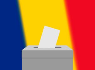 photo of a person's hand depositing their vote in a ballot box, with the flag of Romania in the background