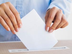 woman holding empty ballot