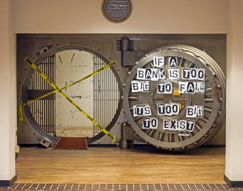 Vault at former Poughkeepsie Savings Bank building, Poughkeepsie, NY, USA, decorated with a quote from Bernie Sanders: "If a bank is too big to fail. it is too big to exist."
