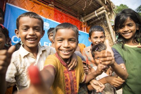 Rohingya children playing at a UNICEF child friendly space, supported by UK aid, inside Batukhali refugee camp in Bangladesh.