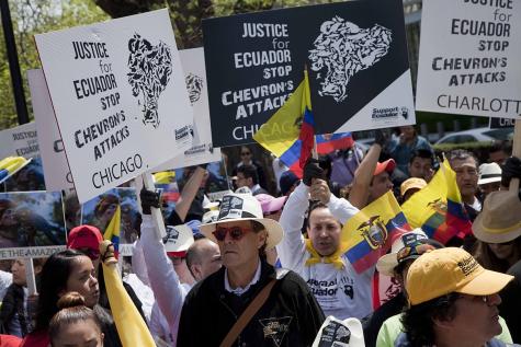 Protesters gather in front of the World Bank to demand justice in the Chevron III case for their pollution of Ecuador.